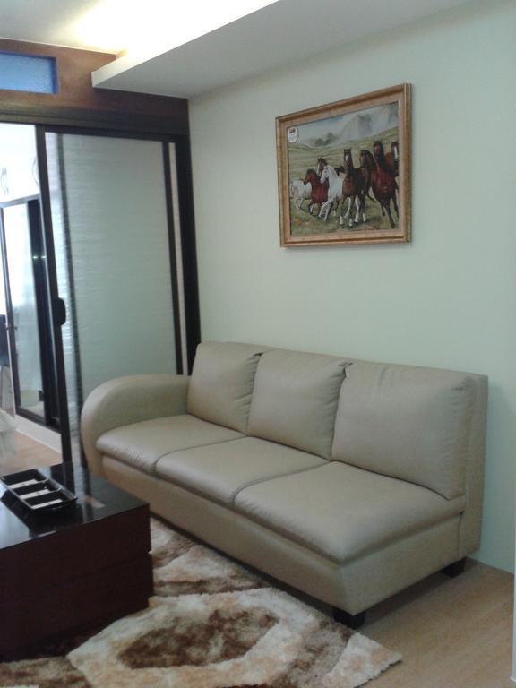 The Oasis Davao Condotel Room photo