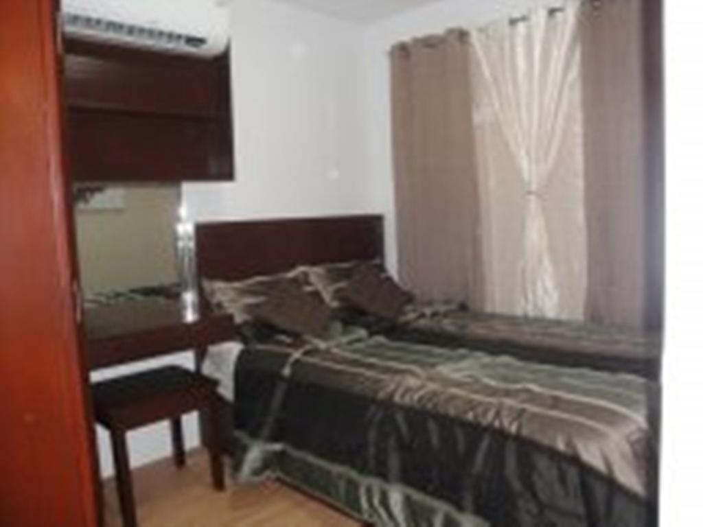 The Oasis Davao Condotel Room photo